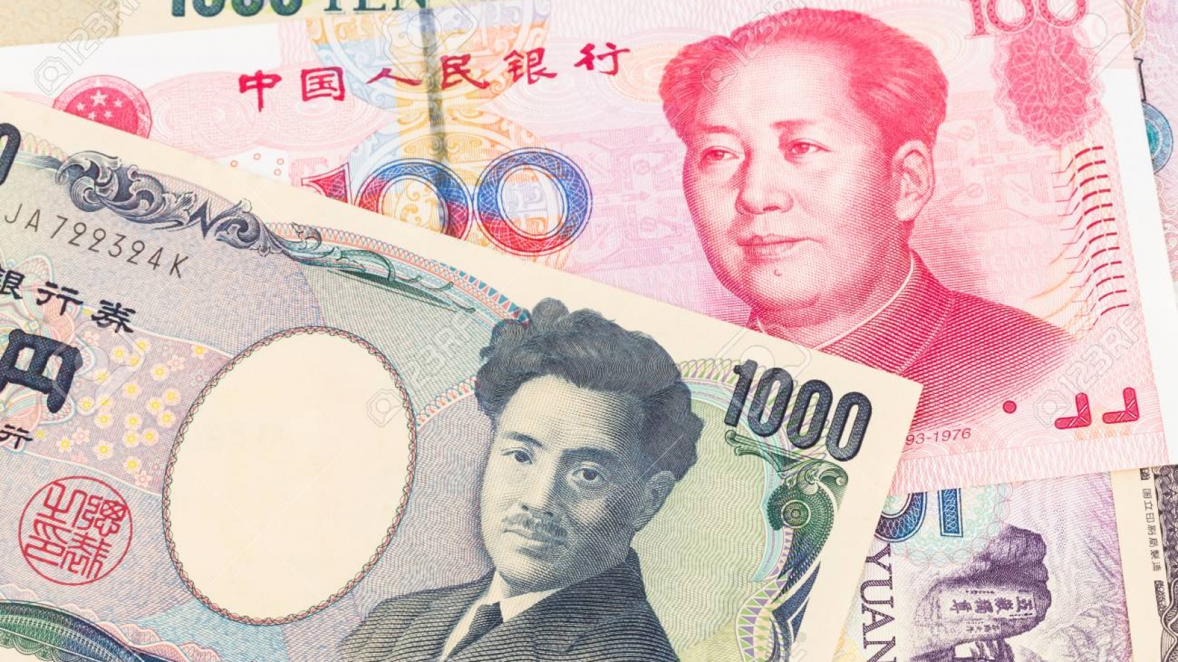 Japanese Yen and Chinese Yuan banknote money
