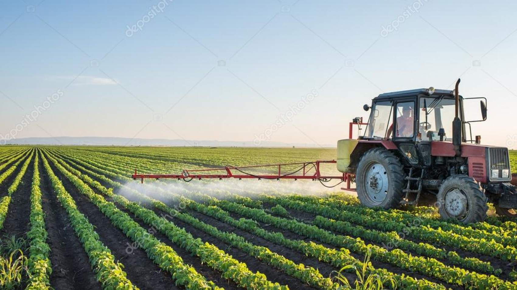 depositphotos_74159063-stock-photo-tractor-spraying