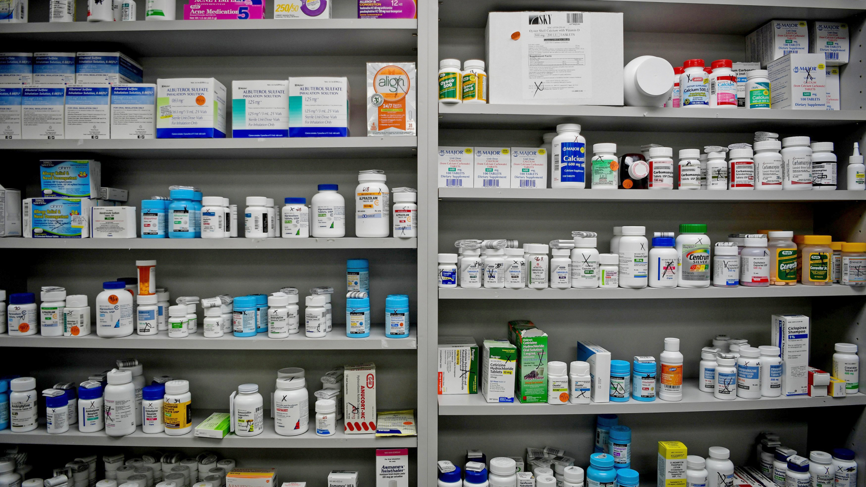 FILE PHOTO - Bottles of medications line the shelves at a pharmacy in Portsmouth, Ohio, U.S. on June 21, 2017.        To match Special Report USA-HEALTHCARE/OPIOIDS       REUTERS/Bryan Woolston/File Photo